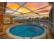 Stunning sunset over the pool and backyard at 5000 Southshore Dr, New Port Richey, FL 34652