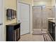 Bathroom featuring a glass-enclosed shower, vanity, and modern fixtures, offering a functional space at 582 8Th Nw St, Ruskin, FL 33570