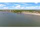 Aerial view of the beach, pier and waterfront restaurant at 582 8Th Nw St, Ruskin, FL 33570