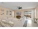 Bright living room with a large sectional sofa, outdoor patio access, and ample natural light at 582 8Th Nw St, Ruskin, FL 33570