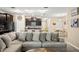 Open floor plan showcasing the living room, kitchen, and dining areas with modern finishes at 582 8Th Nw St, Ruskin, FL 33570