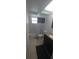 Bathroom with tiled floor, shower/tub combination, toilet, and vanity with granite countertop at 7024 Coral Reef Dr, Port Richey, FL 34668