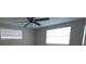 Bedroom showcasing natural light, a ceiling fan, and neutral wall paint at 7024 Coral Reef Dr, Port Richey, FL 34668