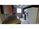 Charming kitchen featuring granite countertops and updated white appliances at 7024 Coral Reef Dr, Port Richey, FL 34668