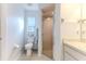 Clean bathroom featuring a toilet, glass-enclosed shower, and modern fixtures at 7107 Pond View Ct, Spring Hill, FL 34606