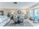 Cozy living room showcasing a relaxing ambiance with comfortable sofas and a calming color palette at 7107 Pond View Ct, Spring Hill, FL 34606