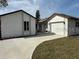 Charming single Gathering house with driveway and two car garage at 7336 Ivory Ter, New Port Richey, FL 34655