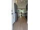 Modern kitchen with hardwood floors, stainless steel appliances and open concept design at 7336 Ivory Ter, New Port Richey, FL 34655