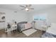Bright bedroom with twin beds, side tables, and view of the sea at 8251 Brent St # 918, Port Richey, FL 34668