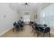 A dedicated card room with multiple tables and chairs, creating a social space for friendly card games at 8251 Brent St # 918, Port Richey, FL 34668