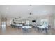 Spacious clubhouse features tile floors, modern lighting, and plenty of seating for entertaining guests at 8251 Brent St # 918, Port Richey, FL 34668