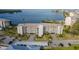 Beautiful condominium building with lush landscaping and waterfront views, offering a serene coastal living experience at 8251 Brent St # 918, Port Richey, FL 34668