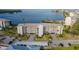 Beautiful waterfront condominium with lush landscaping, covered parking, and serene water views at 8251 Brent St # 918, Port Richey, FL 34668