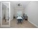 Bright and spacious game room featuring a large table with chairs, ideal for board games, puzzles, and other activities at 8251 Brent St # 918, Port Richey, FL 34668