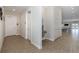 Hallway features recessed lighting, tile floors, water fountain, and access to amenities and common areas at 8251 Brent St # 918, Port Richey, FL 34668