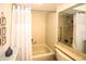 This bathroom has a tub with shower at 9321 Whitstone Ct, New Port Richey, FL 34655