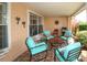 Inviting patio with comfortable seating, perfect for outdoor entertaining and grilling with a gas BBQ at 9321 Whitstone Ct, New Port Richey, FL 34655