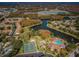 Aerial view of community featuring winding waterways, landscaping, and various community amenities at 9336 Cape Charles Ave, New Port Richey, FL 34655