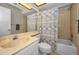 Clean bathroom featuring a shower and tub combination with a shower curtain at 9336 Cape Charles Ave, New Port Richey, FL 34655