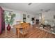 Open concept living and dining area featuring hardwood floors at 9336 Cape Charles Ave, New Port Richey, FL 34655