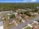 Aerial view of the home situated in a residential neighborhood at 10399 Elgin Blvd, Spring Hill, FL 34608