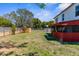 View of the backyard with wood fence at 10399 Elgin Blvd, Spring Hill, FL 34608