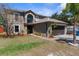 Well-maintained two-story home with front lawn, driveway, and a two-car garage at 10399 Elgin Blvd, Spring Hill, FL 34608