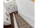 Staircase featuring carpeted stairs with a view from the top landing at 10399 Elgin Blvd, Spring Hill, FL 34608