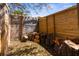 Designated area to store fire wood enclosed by a wooden fence at 10399 Elgin Blvd, Spring Hill, FL 34608
