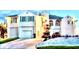 Stunning two-story home with lush landscaping, two-car garage and turquoise window shutters at 121 Augusta Ave, Palm Harbor, FL 34683