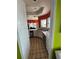 Bright kitchen features stainless steel appliances, tile flooring, and ample counter space at 121 Augusta Ave, Palm Harbor, FL 34683