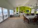Open-concept living room and dining area with views of the water at 121 Augusta Ave, Palm Harbor, FL 34683