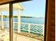 Inviting porch view of the water, showcasing the property's access to scenic beauty and outdoor relaxation at 121 Augusta Ave, Palm Harbor, FL 34683