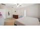 Bright bedroom with a ceiling fan and carpet, featuring a cozy bed and ample natural light at 1250 Halapa Way, Trinity, FL 34655