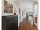 Welcoming entryway with hardwood floors, high ceilings, and stylish decor at 1250 Halapa Way, Trinity, FL 34655