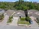 Aerial view of single Gathering home with two car garage and landscaped front yard at 1250 Halapa Way, Trinity, FL 34655