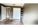 Bedroom featuring wood floors and closet at 13066 Painted Bunting Ave, Weeki Wachee, FL 34614