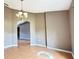 Dining room with hardwood floors and chandelier at 13066 Painted Bunting Ave, Weeki Wachee, FL 34614