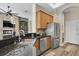Well-equipped kitchen includes stone countertops, modern appliances, and a large sink at 1709 Nodding Thistle Dr, New Port Richey, FL 34655