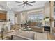 This stylish living room features a cozy seating area and natural light at 1709 Nodding Thistle Dr, New Port Richey, FL 34655
