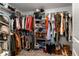 Spacious walk-in closet with extensive shelving and ample storage space at 1957 Fan Aloe Way, Ruskin, FL 33570