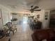 Cozy dining area with dark wood furniture overlooking the pool at 2335 Canfield Dr, Spring Hill, FL 34609