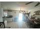 Dining area with chandelier and dark wood table at 2335 Canfield Dr, Spring Hill, FL 34609