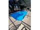 Sparkling pool with screened enclosure, perfect for outdoor entertaining at 2335 Canfield Dr, Spring Hill, FL 34609