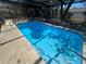 Refreshing pool with crystal-clear water, perfect for summer enjoyment at 2335 Canfield Dr, Spring Hill, FL 34609