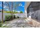 Backyard patio featuring a small backyard with a screened-in lanai at 2506 W Ivy St, Tampa, FL 33607