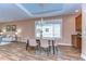 Cozy dining room area featuring wood floors and stylish decor at 2506 W Ivy St, Tampa, FL 33607