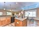 Bright open kitchen view with pendant lights and a spacious dining area at 2506 W Ivy St, Tampa, FL 33607