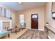Inviting living room with modern decor, hardwood floors, and a decorative fireplace at 2506 W Ivy St, Tampa, FL 33607