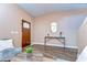 Well-lit living room with hardwood floors, a console table and stylish decor at 2506 W Ivy St, Tampa, FL 33607